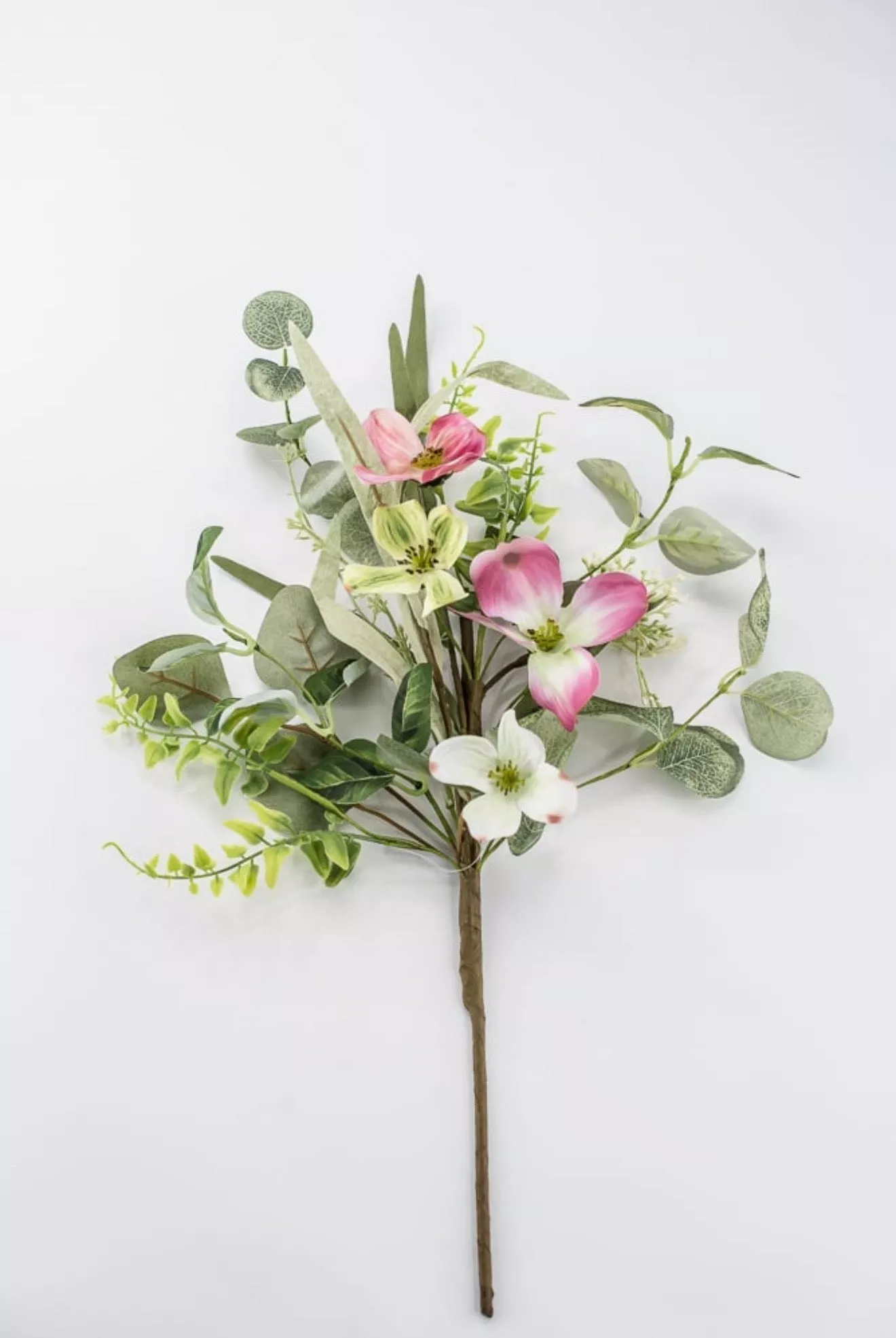 Artificial pink dogwood and greenery pick